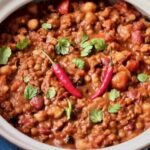 a mixed bean chili in a serving bowl