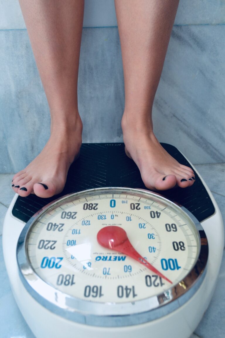 a woman standing on a scale