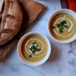 a low calorie leek and potato soup served in two bowls
