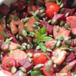 beetroot and cucumber salad in a serving bowl