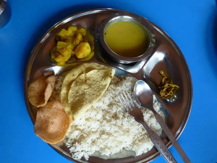 dahl served on a dish with other foods