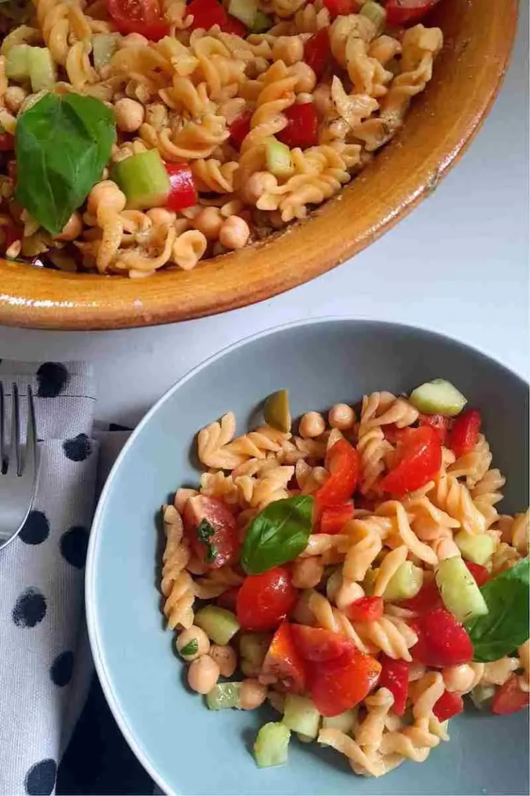 high protein red lentil pasta salad in two bowls