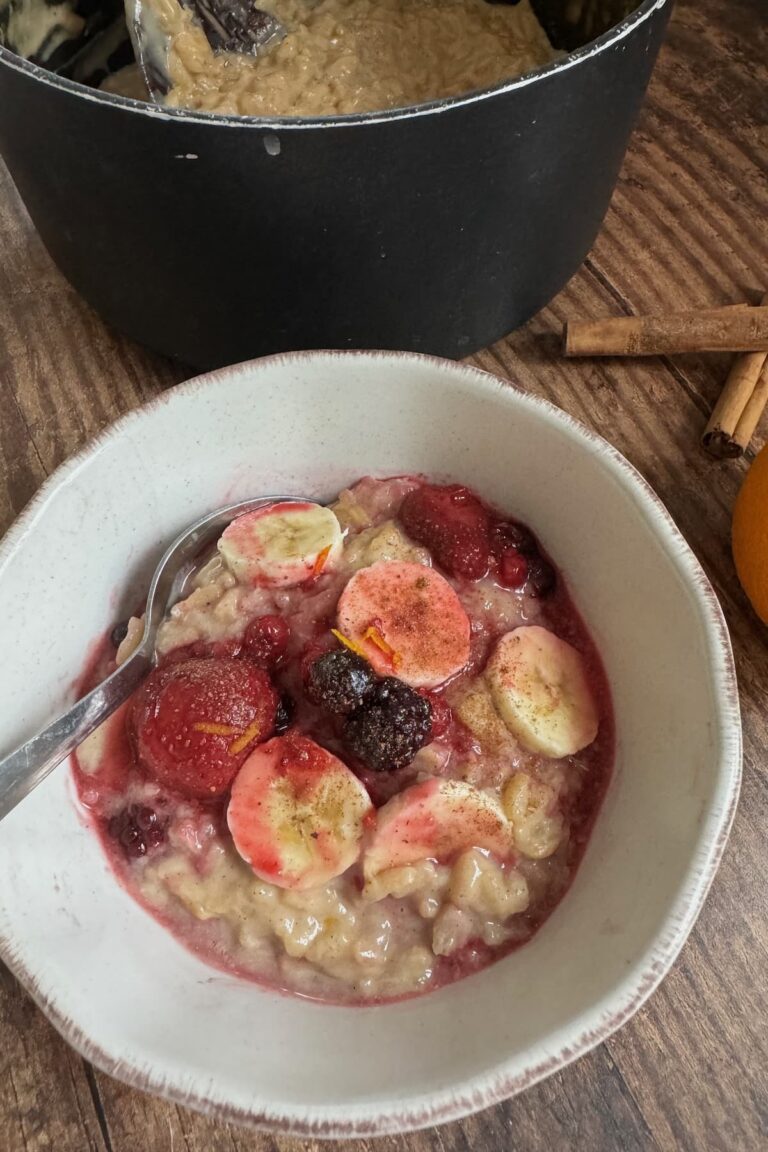 oat milk rice pudding served with berry compote