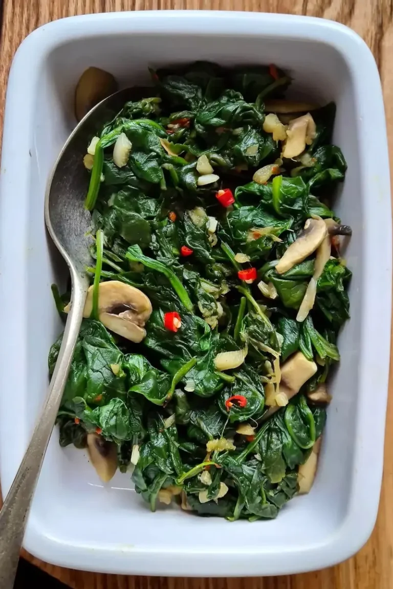 spinach with mushrooms in a dish