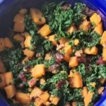 kale and butternut squash salad in a salad bowl