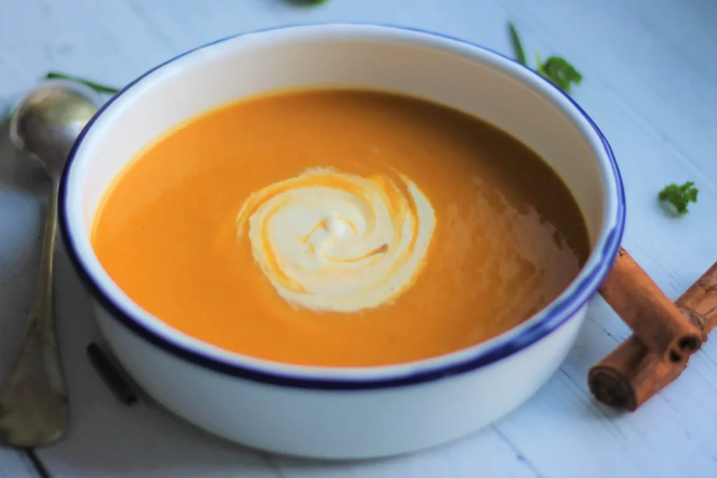 sweet potato and butternut squash soup in a bowl