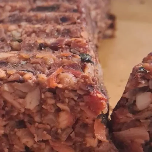 a gluten free vegan mushroom nut roast served on a plate