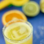 a margarita mocktail served in a glass with with