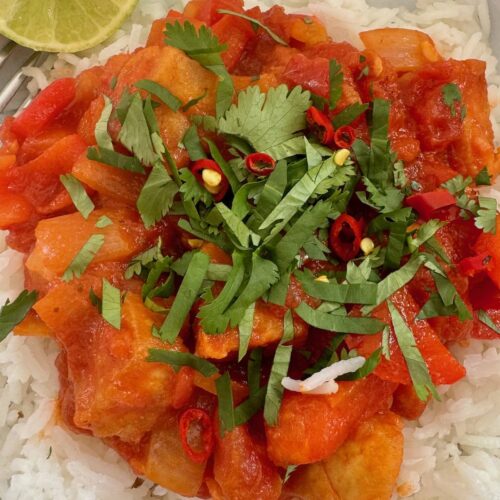 Tofu in tomato sauce served in a bowl