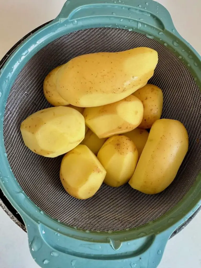potatoes half peeled for air frying