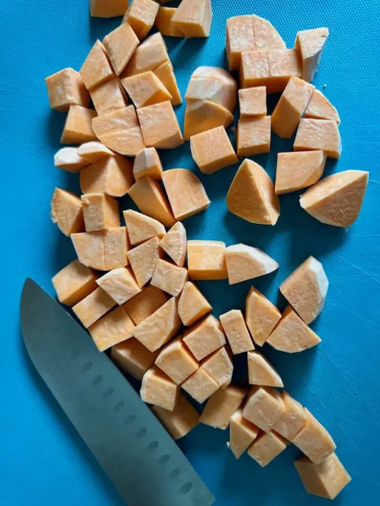 sweet potatoes cut on chopping board