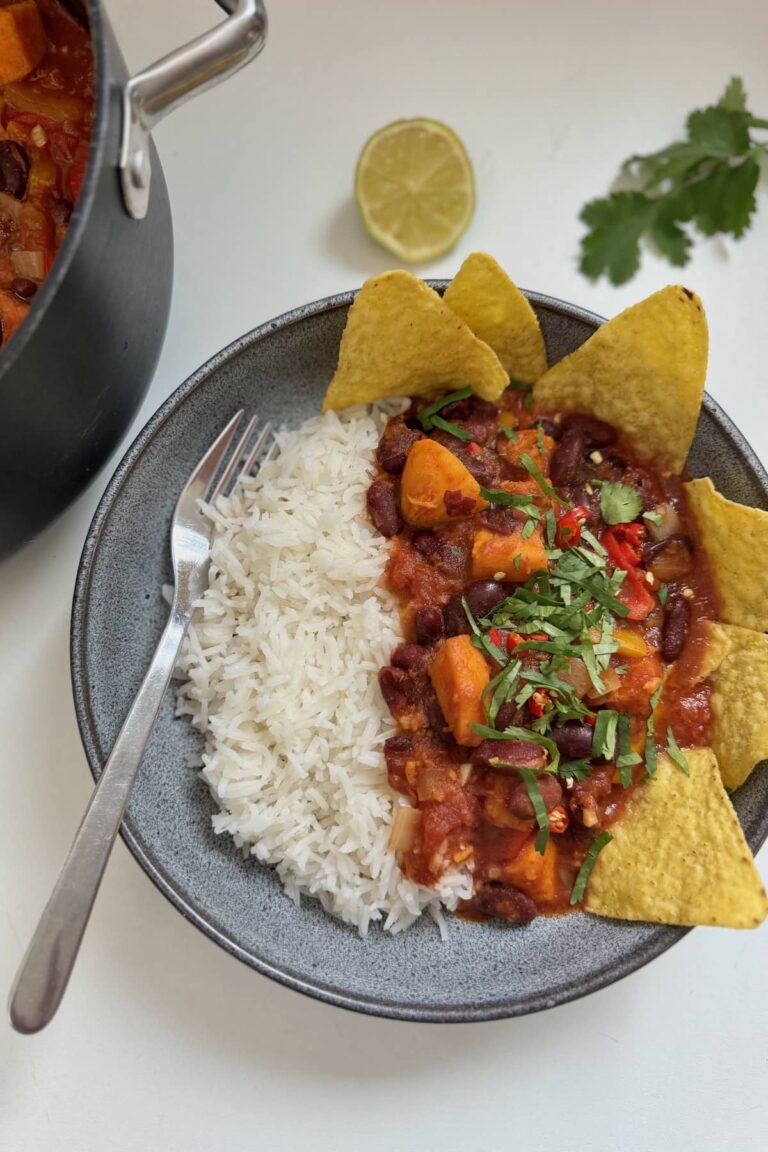 jamie oliver style veggie chilli served with rice and nacho chips