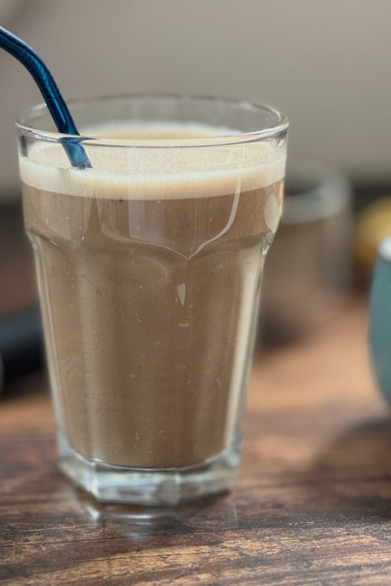 Coffee banana and oat smoothie served in a glass