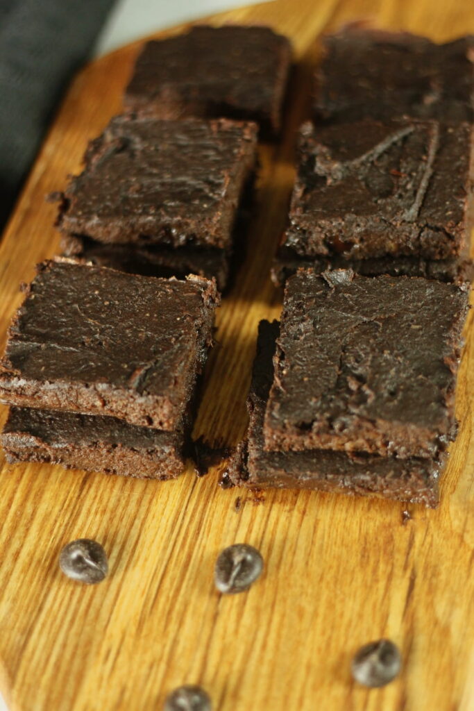 vegan sweet potato brownies laid out on a board