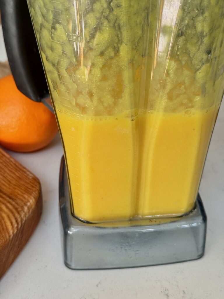 Turmeric Ginger Citrus Shots after blending in a Vitamix